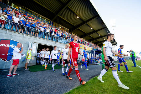 Goalkeeper André Hansen and Mike Jensen of Rosenborg