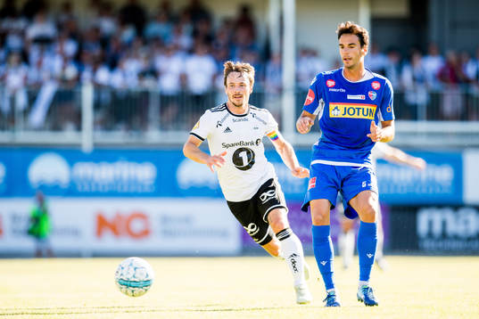 Mike Jensen of Rosenborg and Enric Valles of Sandefjord