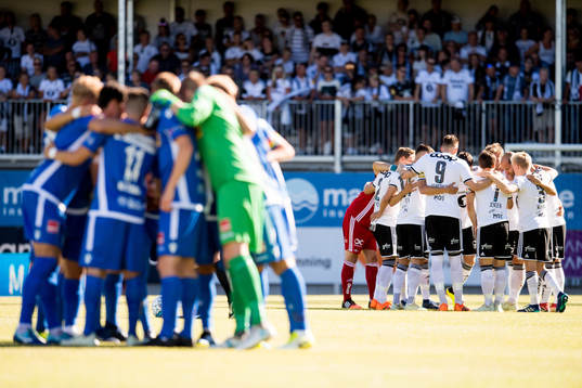 The two team gather