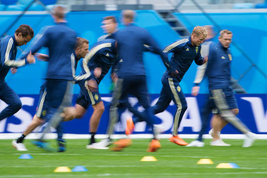 Oscar Hiljemark (R) of the Swedish national football team