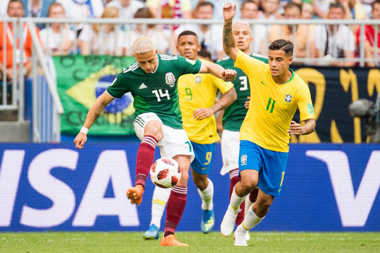 Javier Hernandez of Mexico and Philippe Coutinho of Brazil