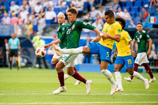 Edson Alvarez of Mexico and Casemiro of Brazil
