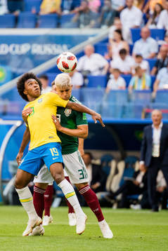 Willian of Brazil and Carlos Salcedo of Mexico