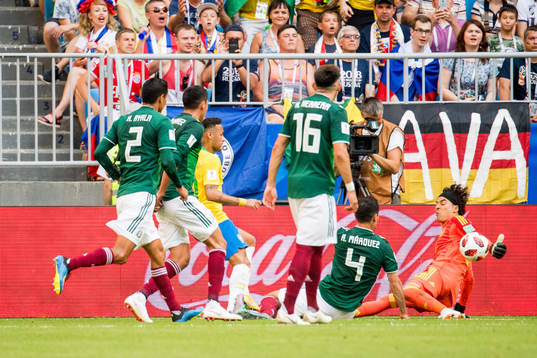Goalkeeper Guillermo Ochoa of Mexico saves a chance by