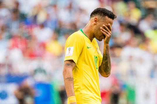 Neymar of Brazil looks dejected