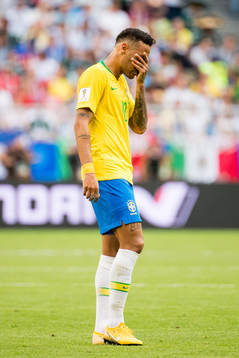 Neymar of Brazil looks dejected