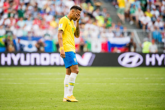 Neymar of Brazil looks dejected