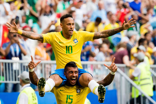 Neymar and Paulinho of Brazil celebrate the 1-0 goal
