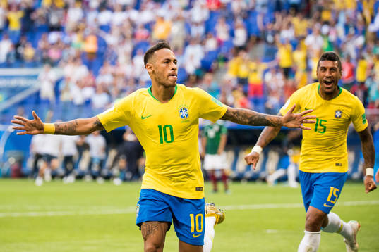 Neymar and Paulinho of Brazil celebrate the 1-0 goal