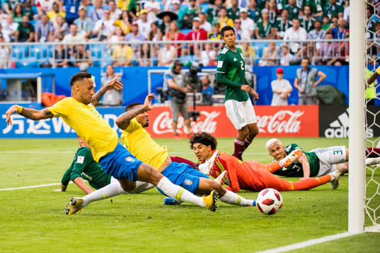 Neymar of Brazil scores the 1-0 goal