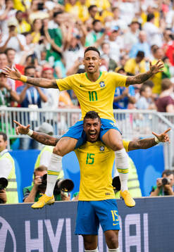 Neymar and Paulinho of Brazil celebrate the 1-0 goal