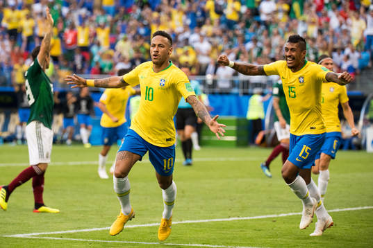 Neymar and Paulinho of Brazil celebrate the 1-0 goal