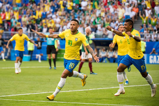 Neymar and Paulinho of Brazil celebrate the 1-0 goal