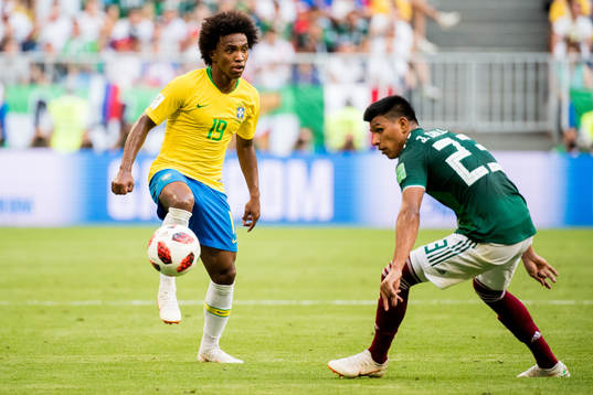 Willian of Brazil and Jesus Gallardo of Mexico
