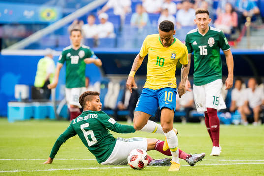 Jonathan Dos Santos of Mexico and Neymar of Brazil