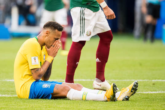 Neymar of Brazil looks dejected