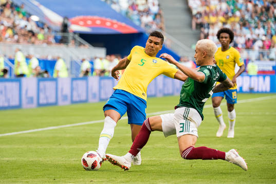 Casemiro of Brazil and Carlos Salcedo of Mexico