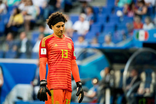 Goalkeeper Guillermo Ochoa of Mexico looks dejected