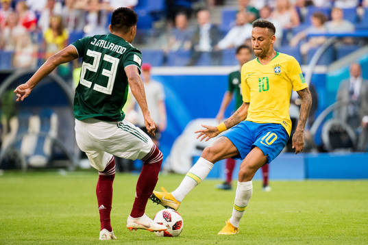 Jesus Gallardo of Mexico and Neymar of Brazil