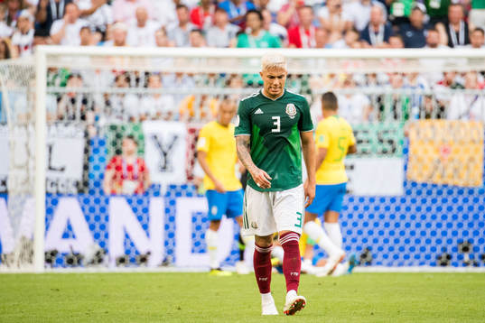 Carlos Salcedo of Mexico looks dejected