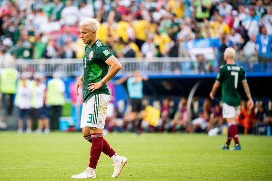 Carlos Salcedo of Mexico looks dejected