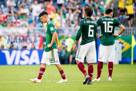 Hirving Lozano of Mexico looks dejected