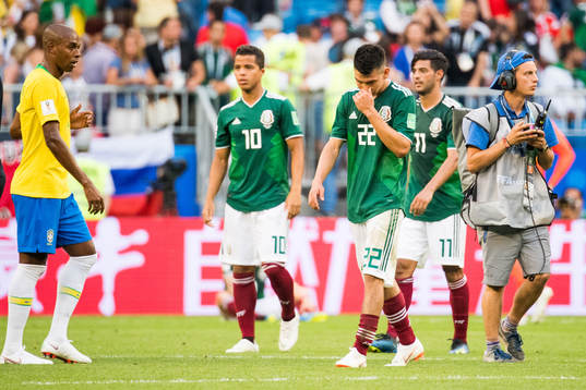 Hirving Lozano of Mexico looks dejected