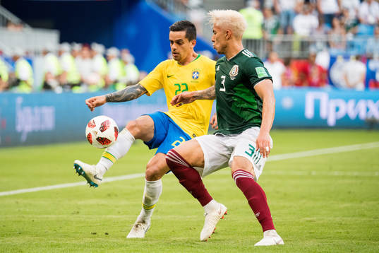 Fagner of Brazil and Carlos Salcedo of Mexico