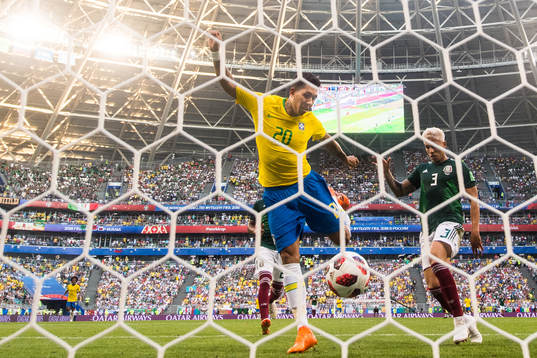 Roberto Firmino of Brazil scores 2-0