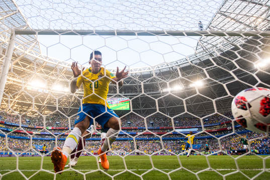 Roberto Firmino of Brazil scores 2-0