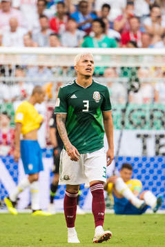 Carlos Salcedo of Mexico looks dejected