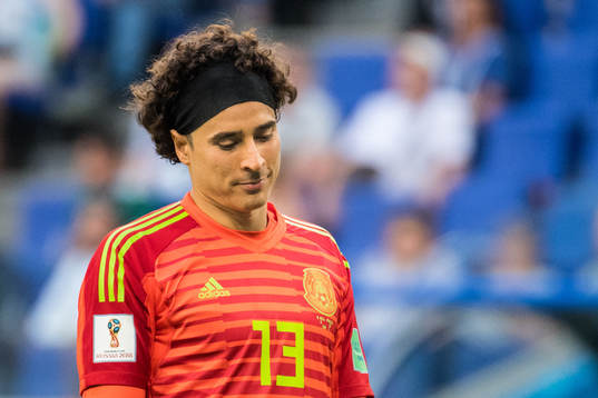 Goalkeeper Guillermo Ochoa of Mexico looks dejected