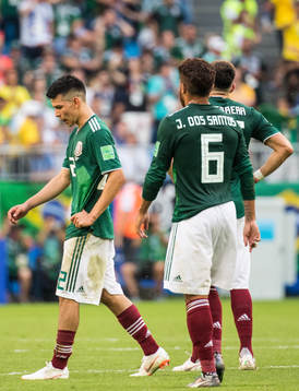 Hirving Lozano of Mexico looks dejected