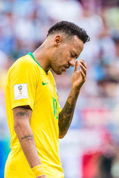 Neymar of Brazil looks dejected