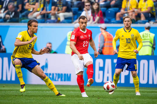 Albin Ekdal and Emil Forsberg with Xherdan Shaqiri of