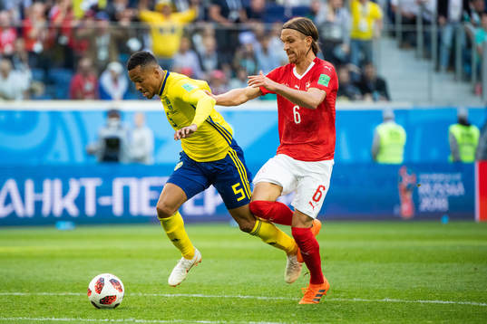 Martin Olsson falls and is awarded a free kick in a duel
