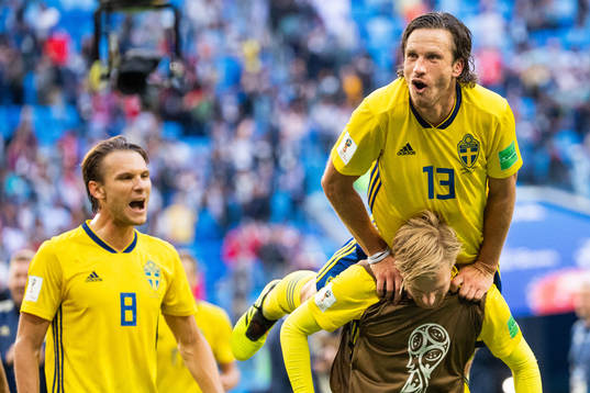 Gustav Svensson and Emil Forsberg of Sweden celebrate