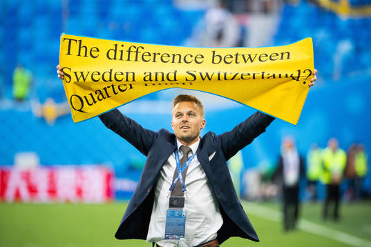 Sebastian Larsson of Sweden with a sign as he celebrate