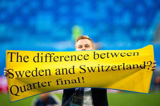 Sebastian Larsson of Sweden with a sign as he celebrate