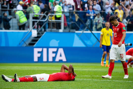 Manuel Akanji and Ricardo Rodriguez of Switzerland looks