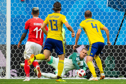 goalkeeper Robin Olsen makes a save