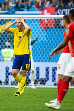 Albin Ekdal and Victor Nilsson Lindelöf of Sweden reacts