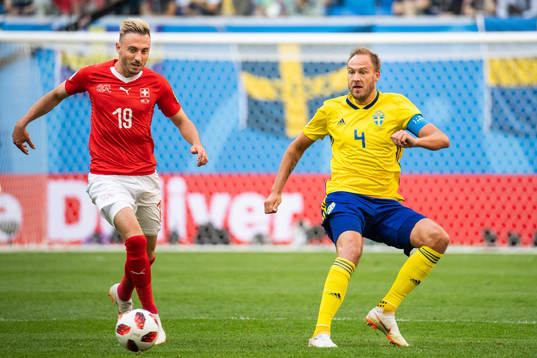 Josip Drmic of Switzerland and Andreas Granqvist of Sweden