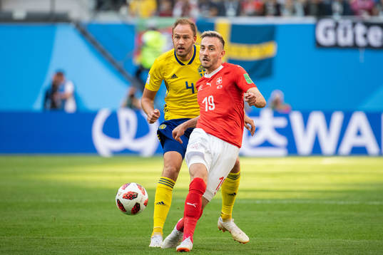 Josip Drmic of Switzerland and Andreas Granqvist of Sweden