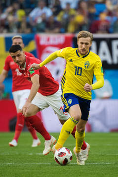 Blerim Dzemaili of Switzerland and Emil Forsberg of Sweden
