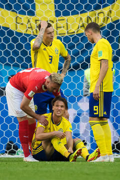 Josip Drmic of Switzerland next to Albin Ekdal of Sweden
