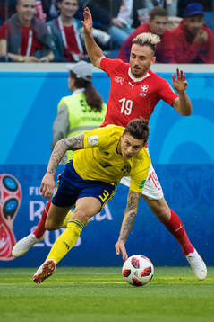 Victor Nilsson Lindelöf of Sweden and Josip Drmic of
