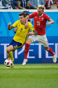 Victor Nilsson Lindelöf of Sweden and Josip Drmic of