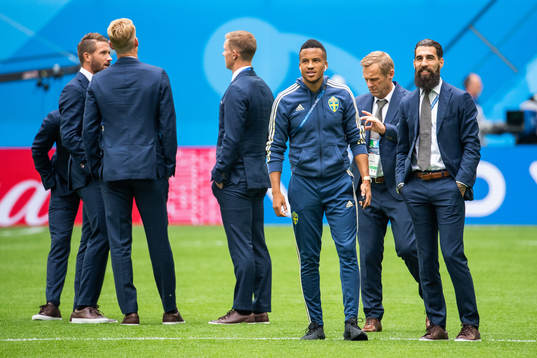 Martin Olsson and Jimmy Durmaz inspects the pitch prior to