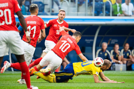 Ola Toivonen competes for the ball